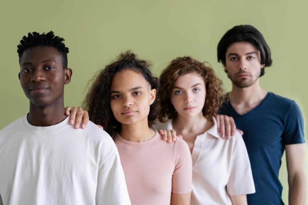 Diverse group of supportive individuals representing mental health awareness and community unity.